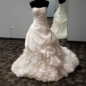 Maggie Sottero Ivory Strapless Ball Gown with Rosette Hem